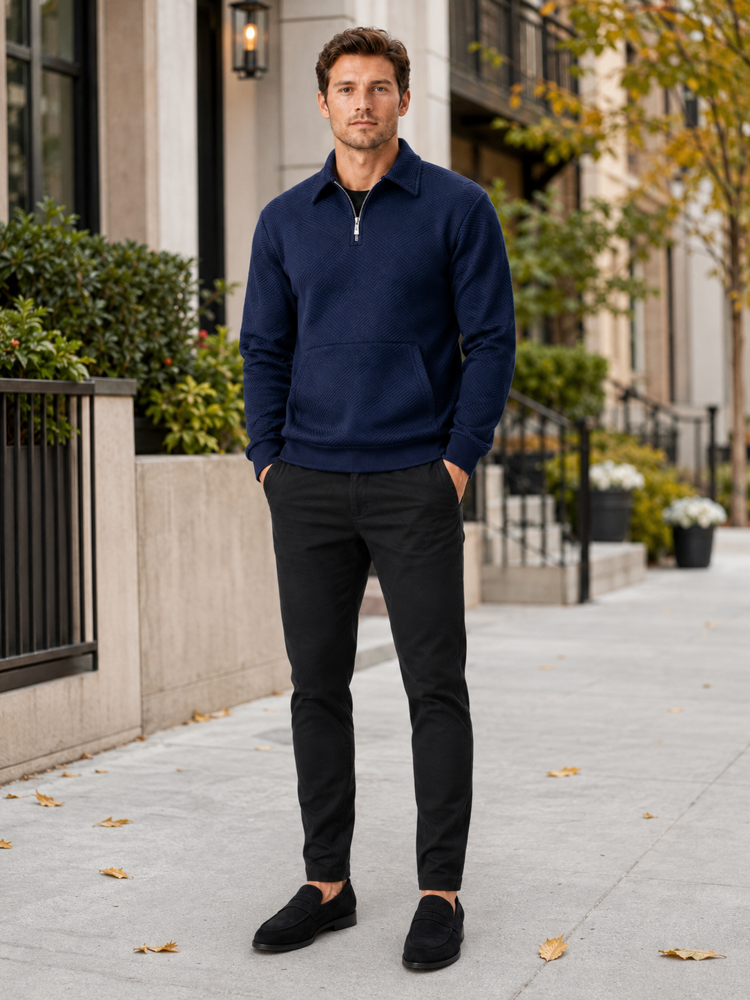 Man styling navy quarter zip sweater in a classic outdoor and everyday lifestyle outfit