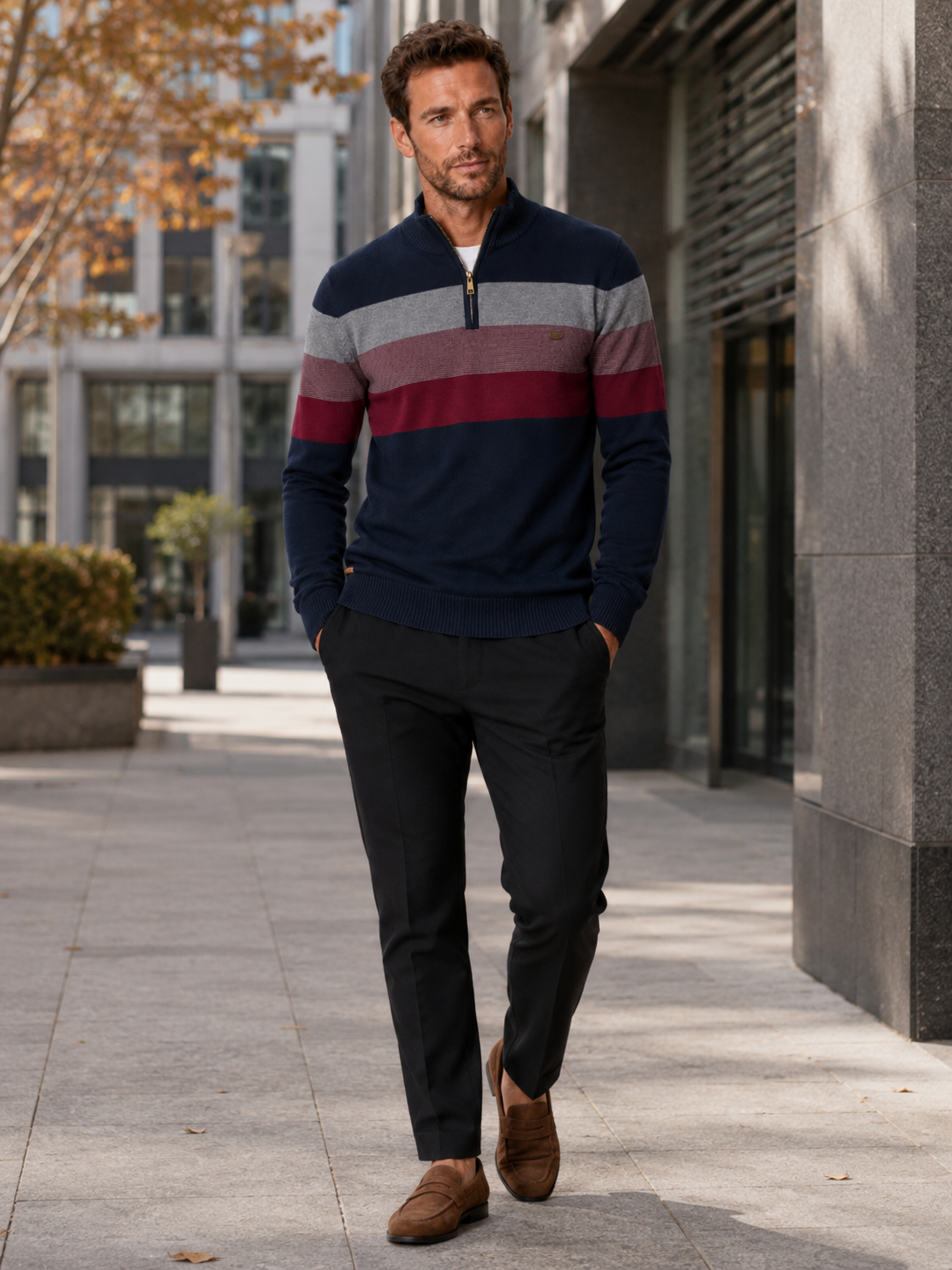 Man wearing a navy patchwork cotton quarter zip sweater in a business casual winter outfit