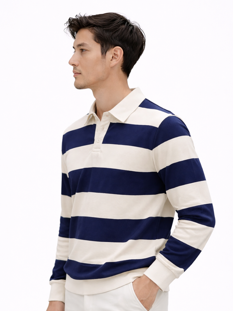 Men’s navy and white striped long sleeve rugby polo shirt worn by model, front view