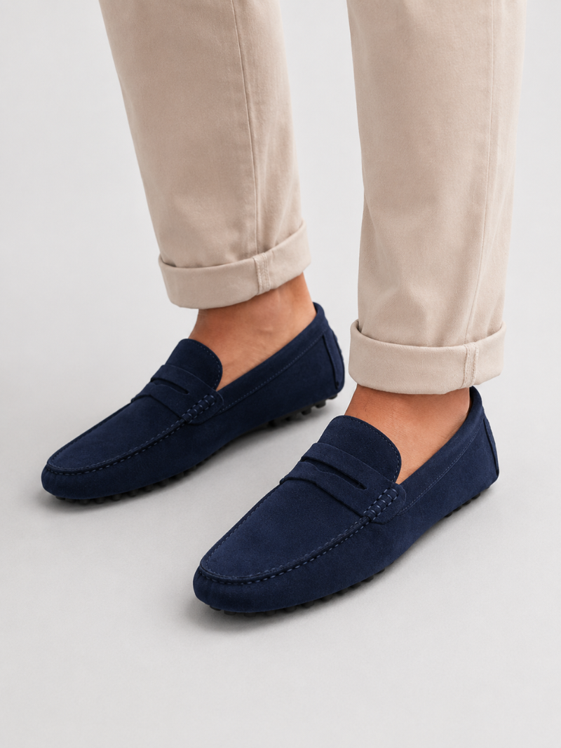 Men wearing navy suede penny loafers handmade leather slip on driving shoes for smart casual wear