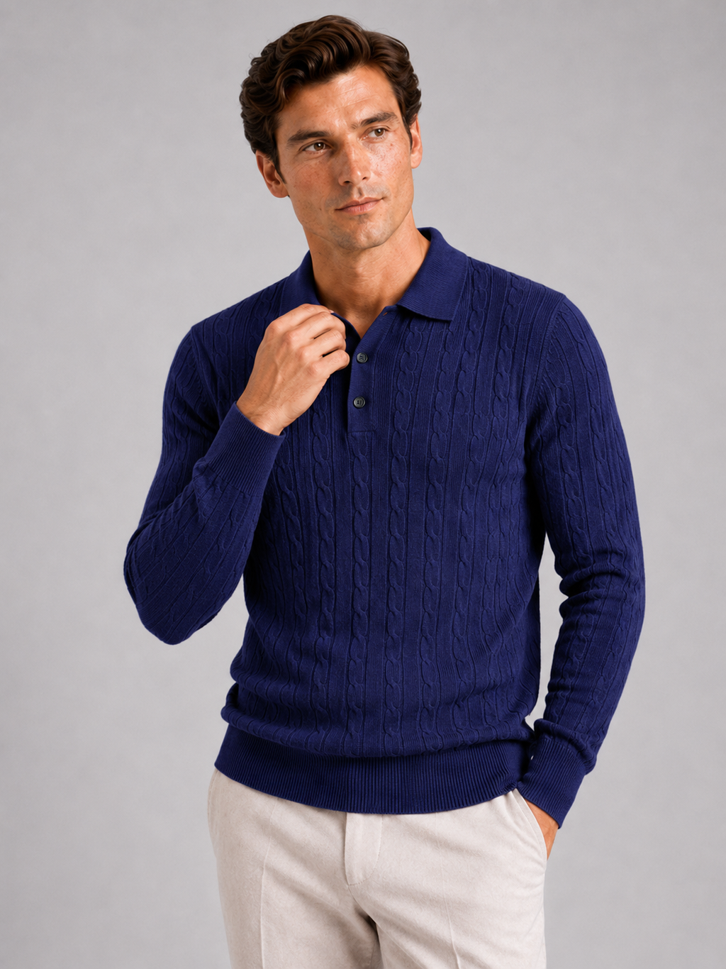 Men wearing navy cable knit long sleeve polo winter layer for business casual style