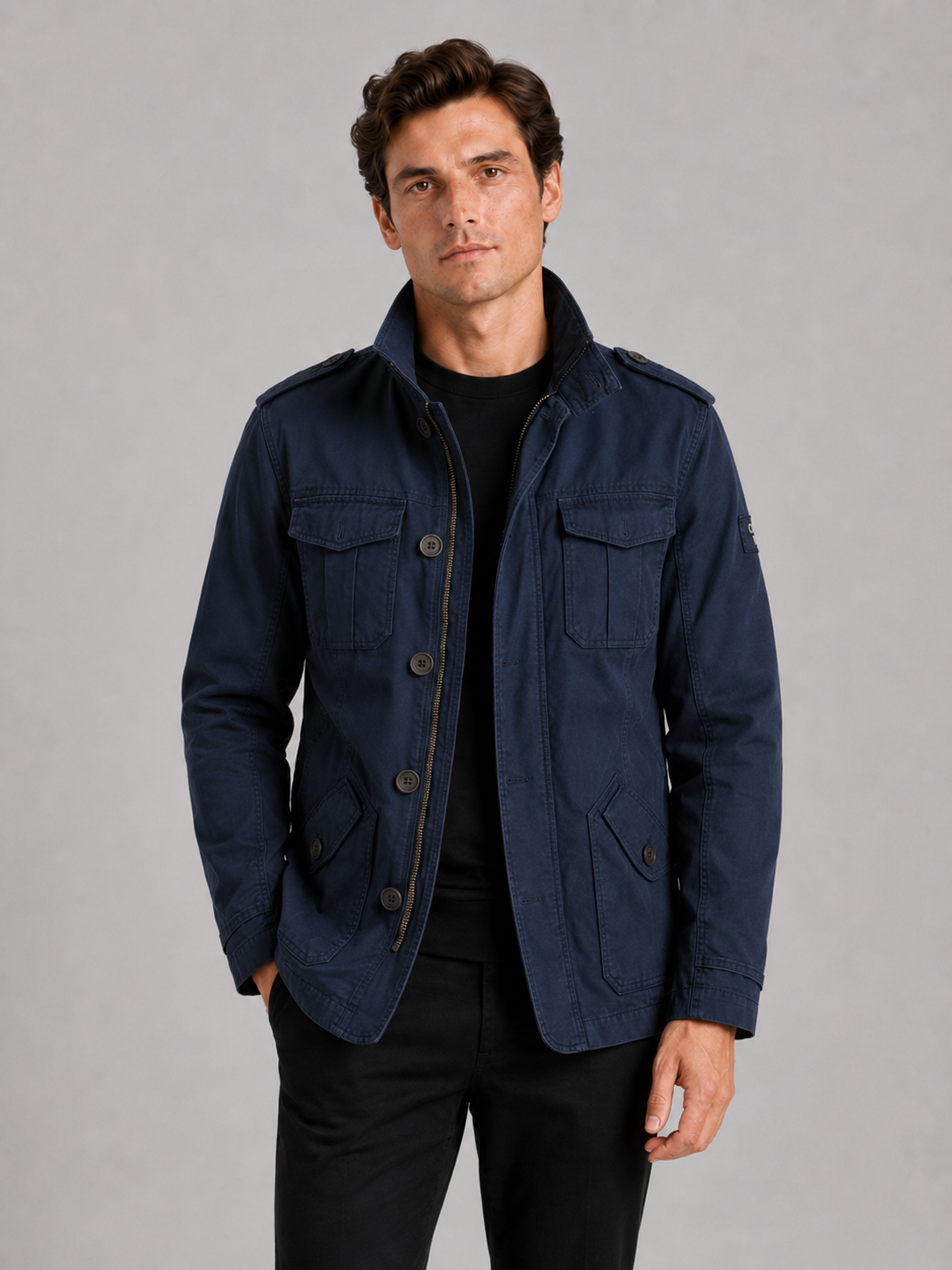 Men wearing navy military cargo jacket heavyweight cotton multi pocket stand collar workwear style