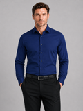 Men wearing navy button down shirt long sleeve non iron stretch business casual office style