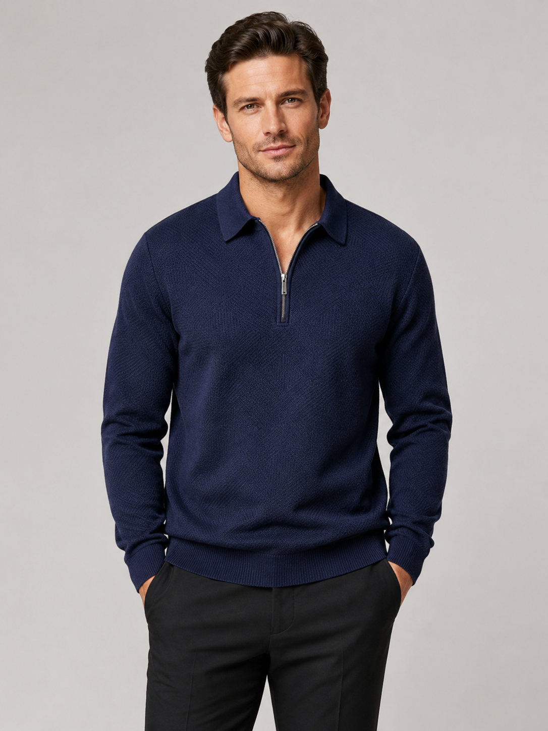 Front view of a man wearing a navy lightweight knit quarter zip polo sweater with long sleeves