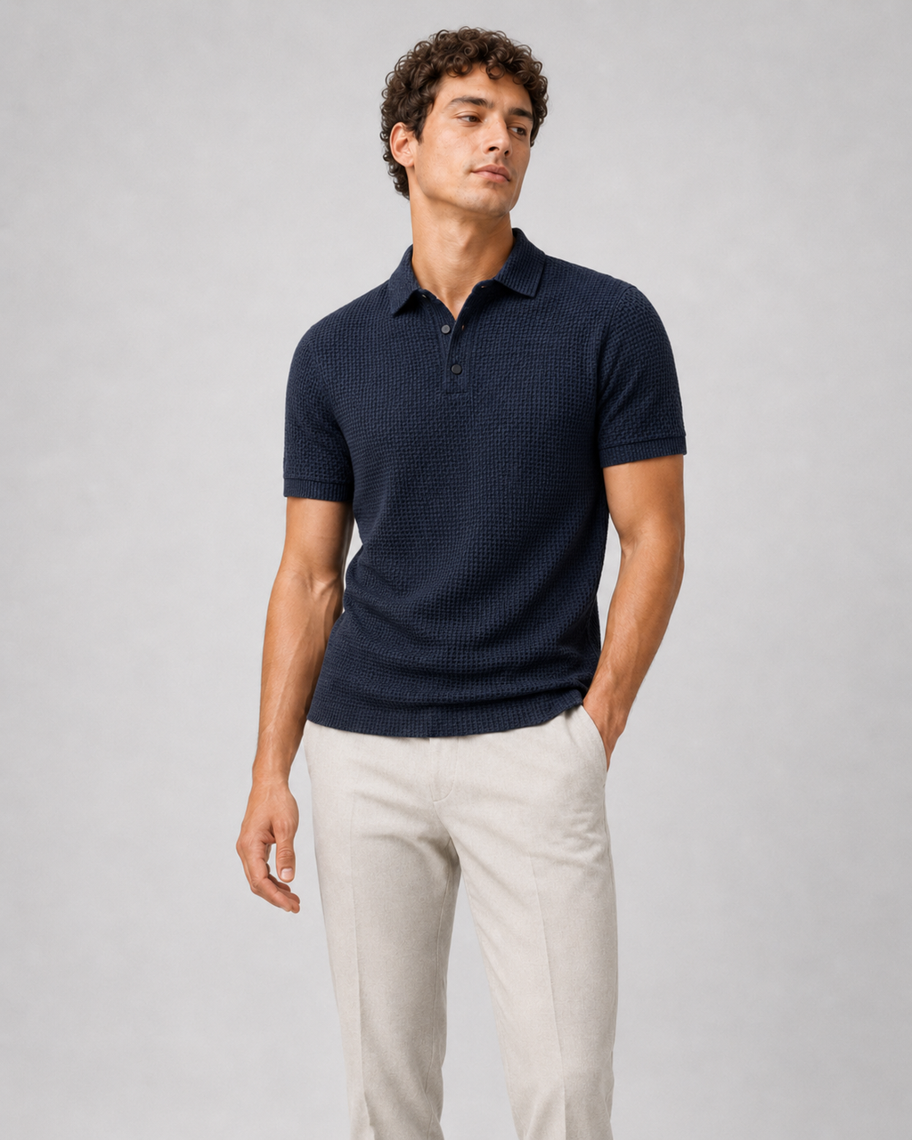Men wearing navy textured knit polo shirt short sleeve button placket business casual summer style