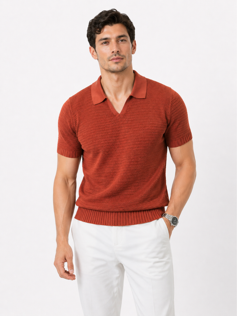 Men wearing orange knit polo shirt lightweight tailored summer top for quiet luxury coastal style