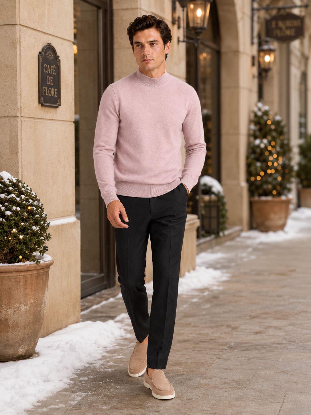 Man styling pink mock neck sweater in a fresh winter lifestyle outfit
