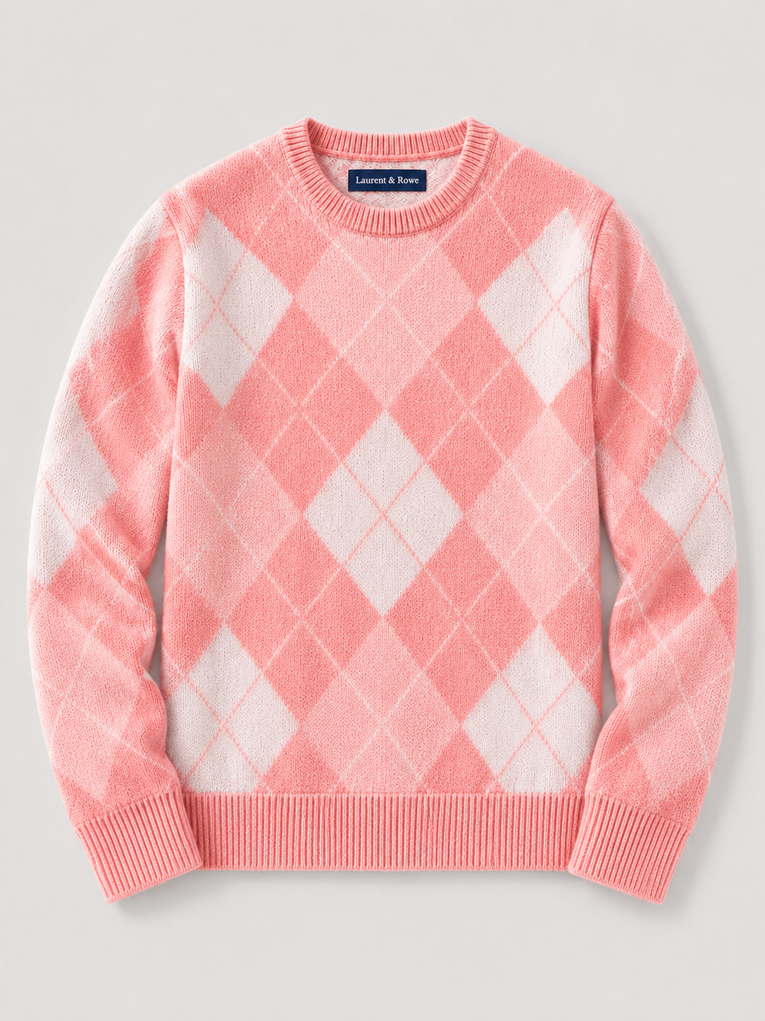 Pink men’s wool argyle crew neck sweater with a thick knit design displayed on a plain background