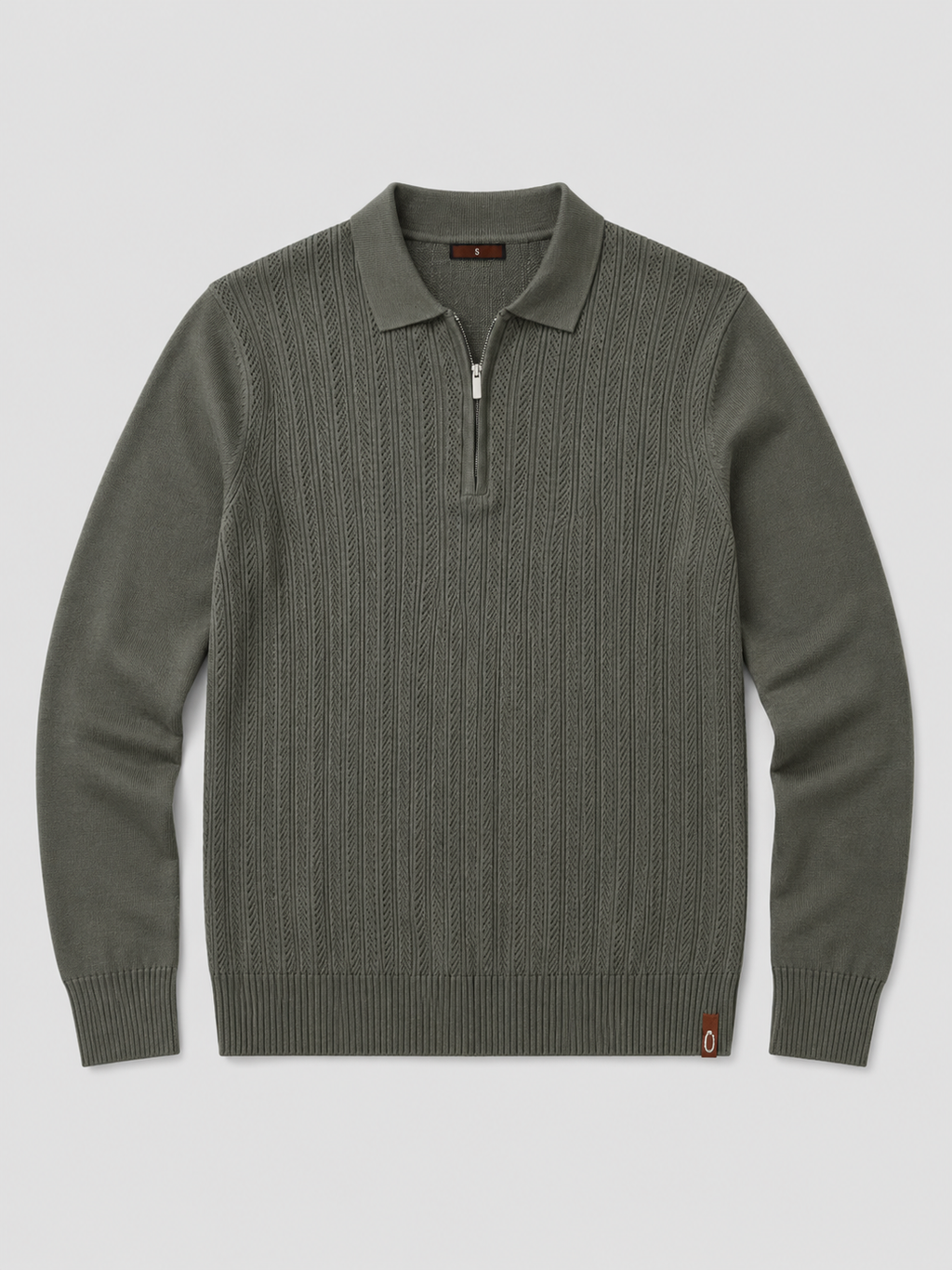 Green men’s slim fit quarter zip polo shirt with textured long sleeve design displayed on a plain background