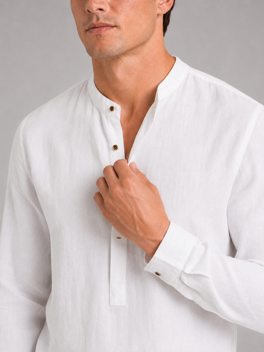 Close up of white band collar shirt showing lightweight breathable fabric and clean collar detail