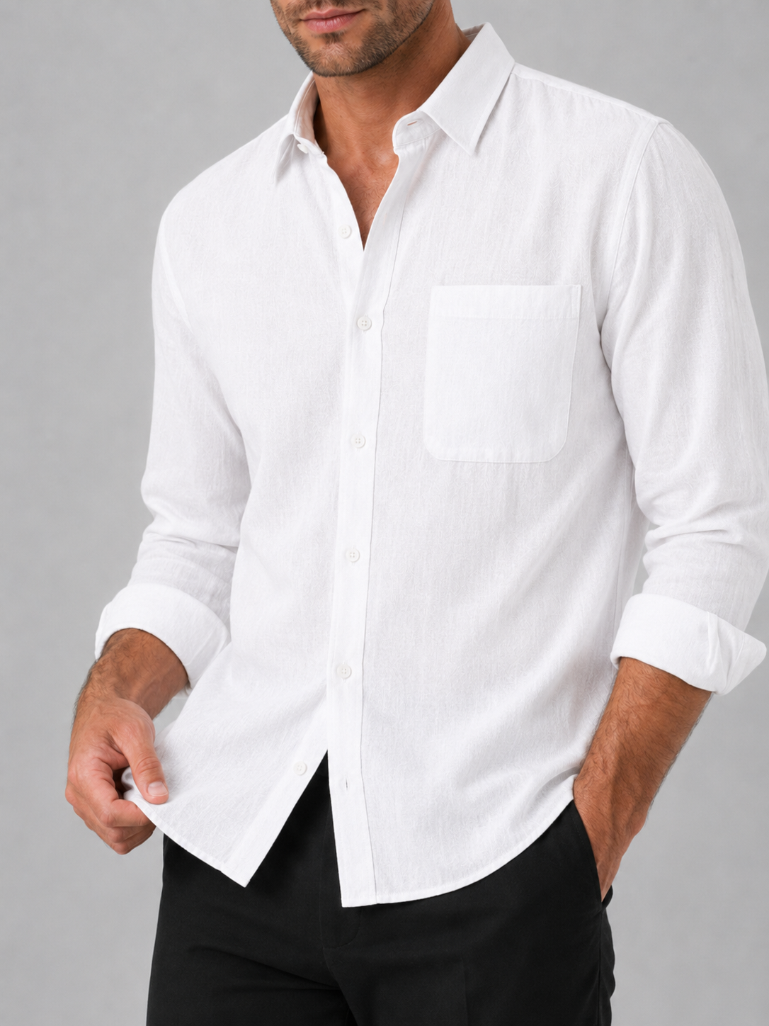 Close up of white button down shirt showing lightweight breathable fabric and classic collar detail