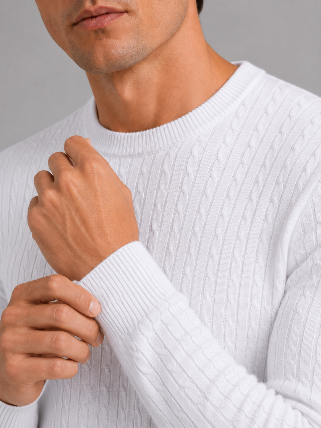 Close up of wine cable knit sweater showing soft textured fabric and clean crew neck detail