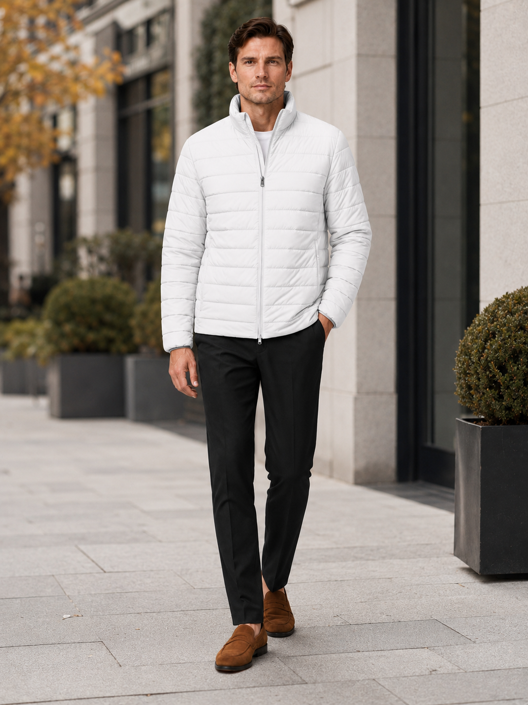 Man styling white down puffer jacket in a clean outdoor and everyday winter lifestyle outfit