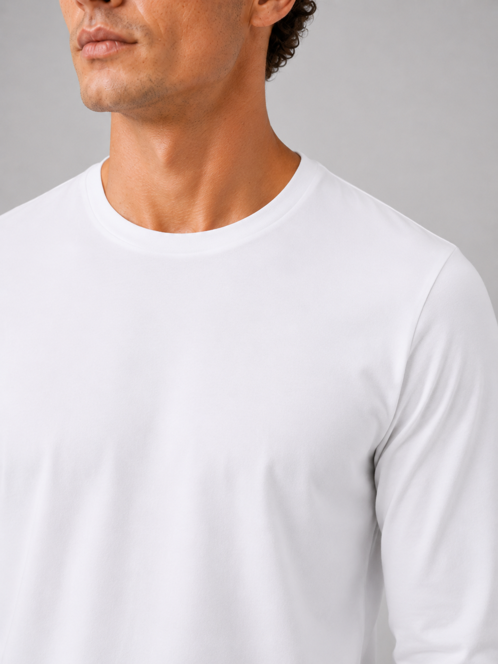 Close up of white t shirt fabric showing soft smooth breathable texture