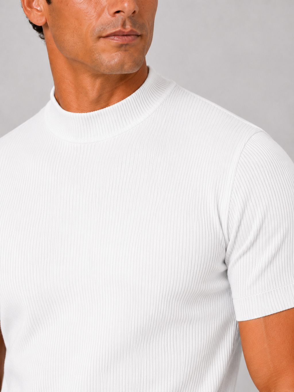 Close up of white ribbed t shirt showing soft stretch fabric and mock neck detail