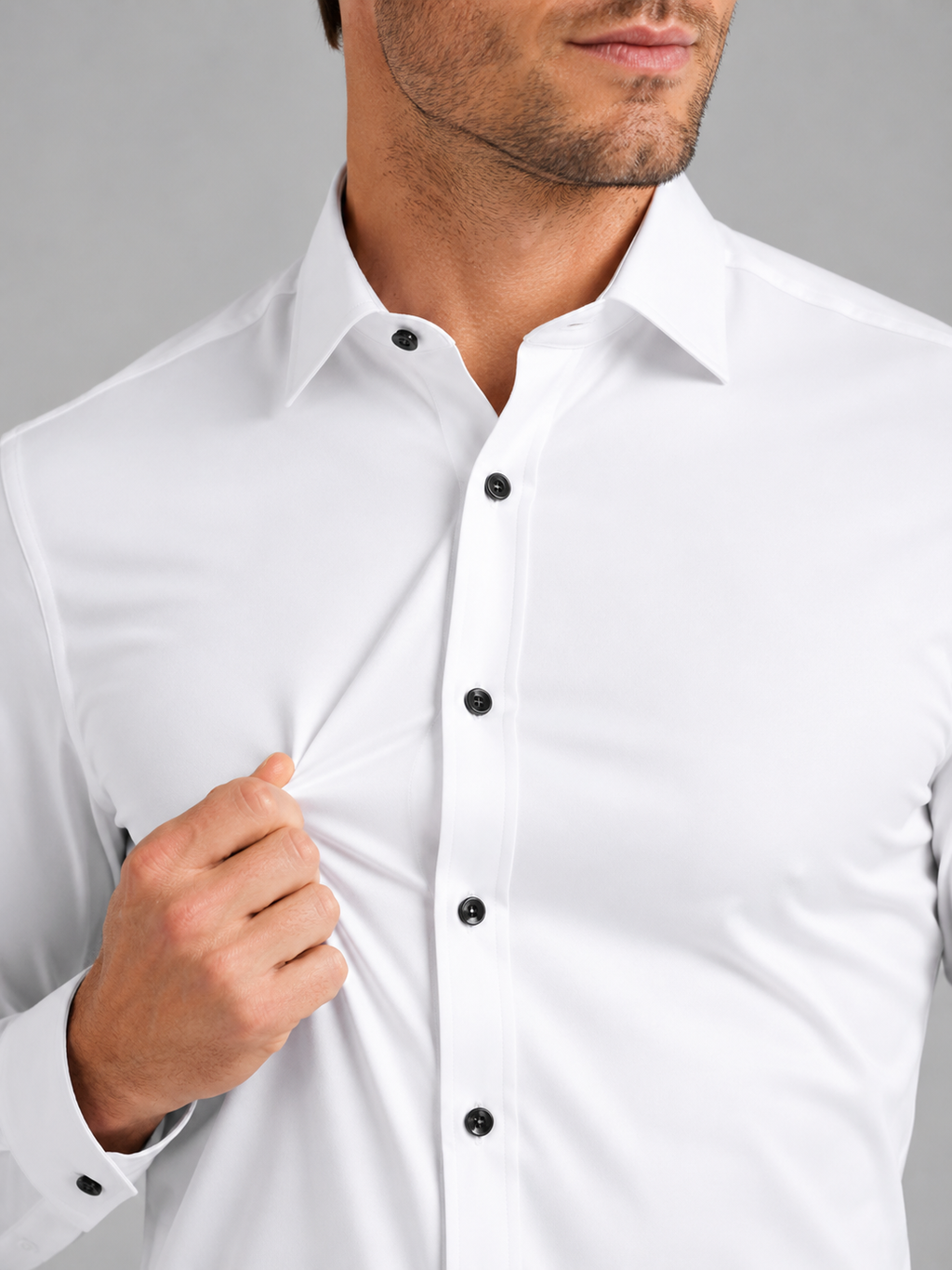 Close up of white dress shirt showing wrinkle resistant stretch fabric and crisp collar detail