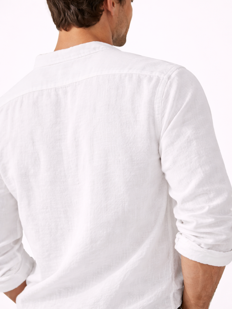 Men wearing white organic linen V-neck shirt, relaxed fit long sleeve summer outfit