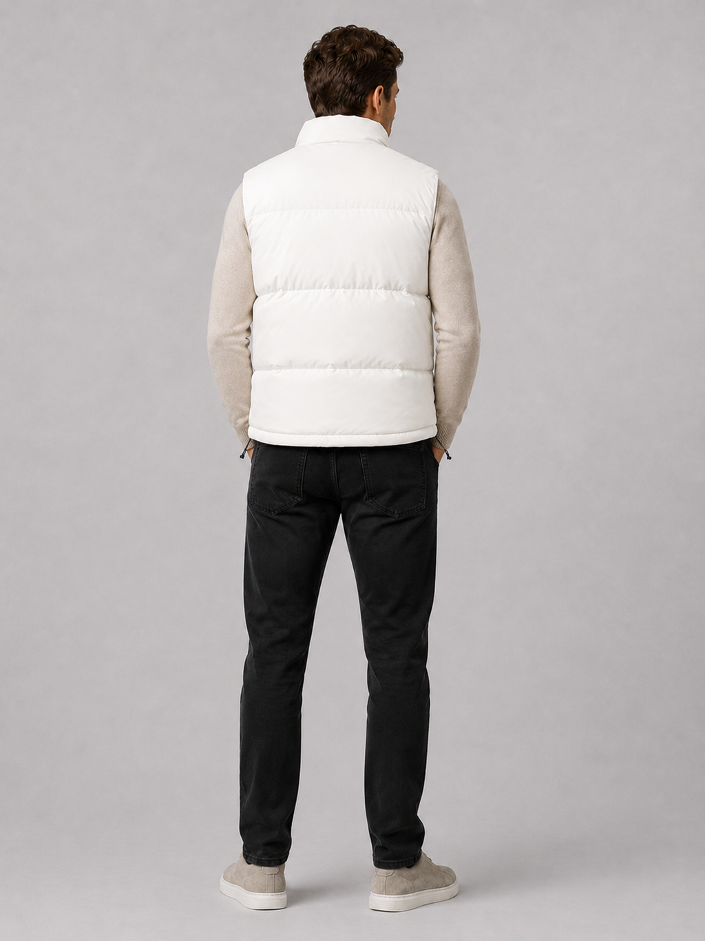 White men’s thick insulated puffer vest displayed on a plain background