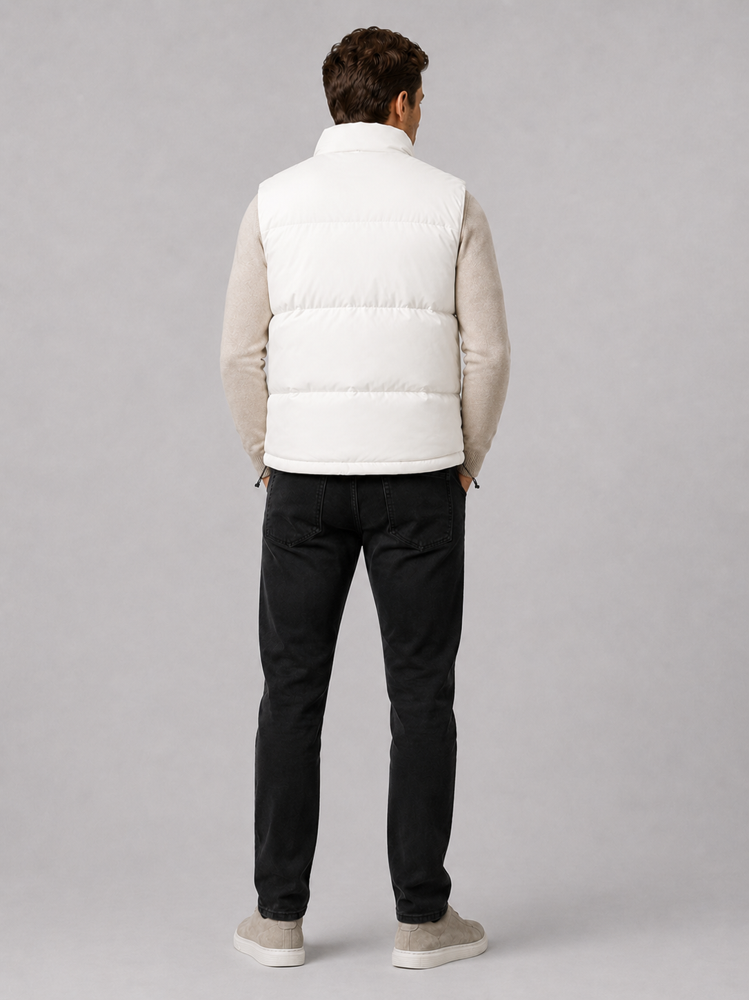 White men’s thick insulated puffer vest displayed on a plain background