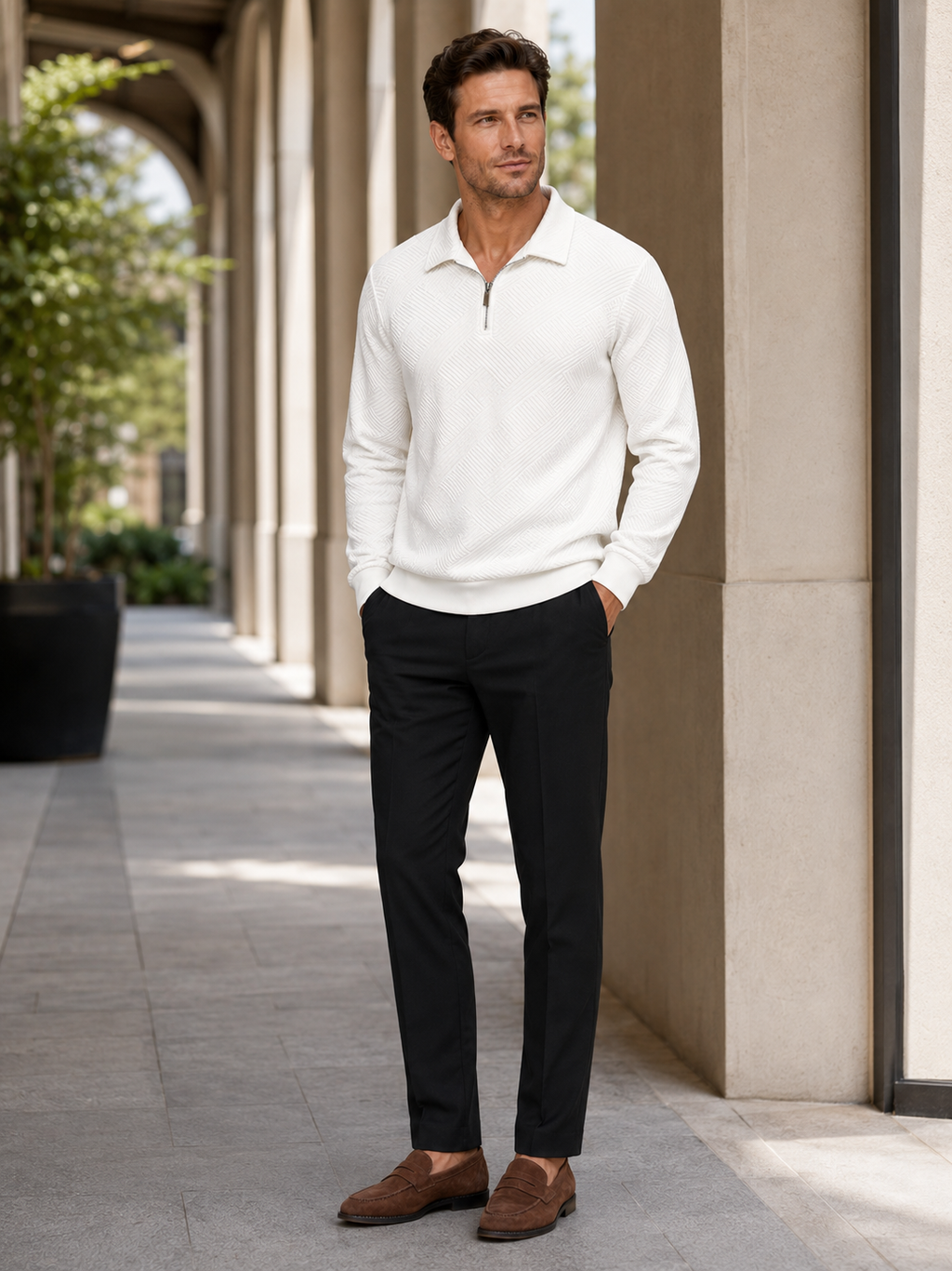Man wearing a white lightweight quarter zip polo sweater in a clean business casual fall winter outfit