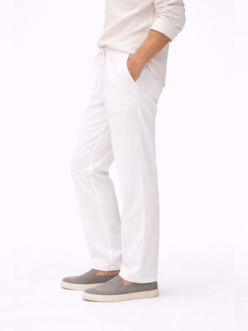 White relaxed fit linen pants soft breathable fabric minimal refined casual look