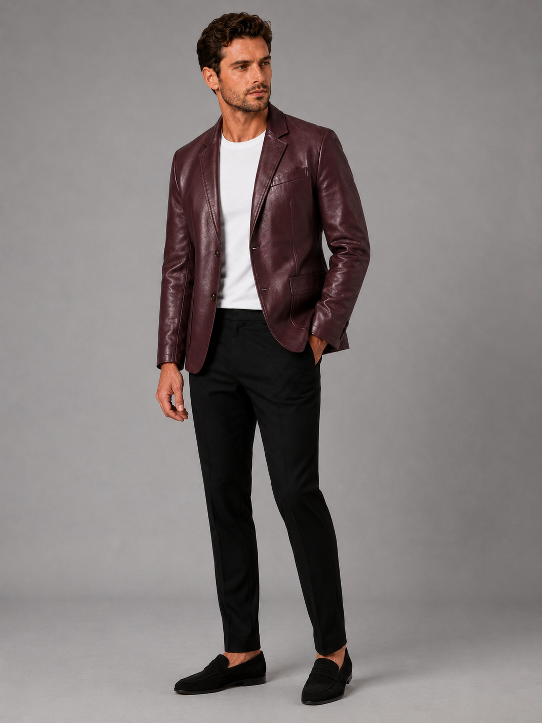 Man wearing a wine red slim fit leather blazer jacket in an elegant business casual office and evening outfit