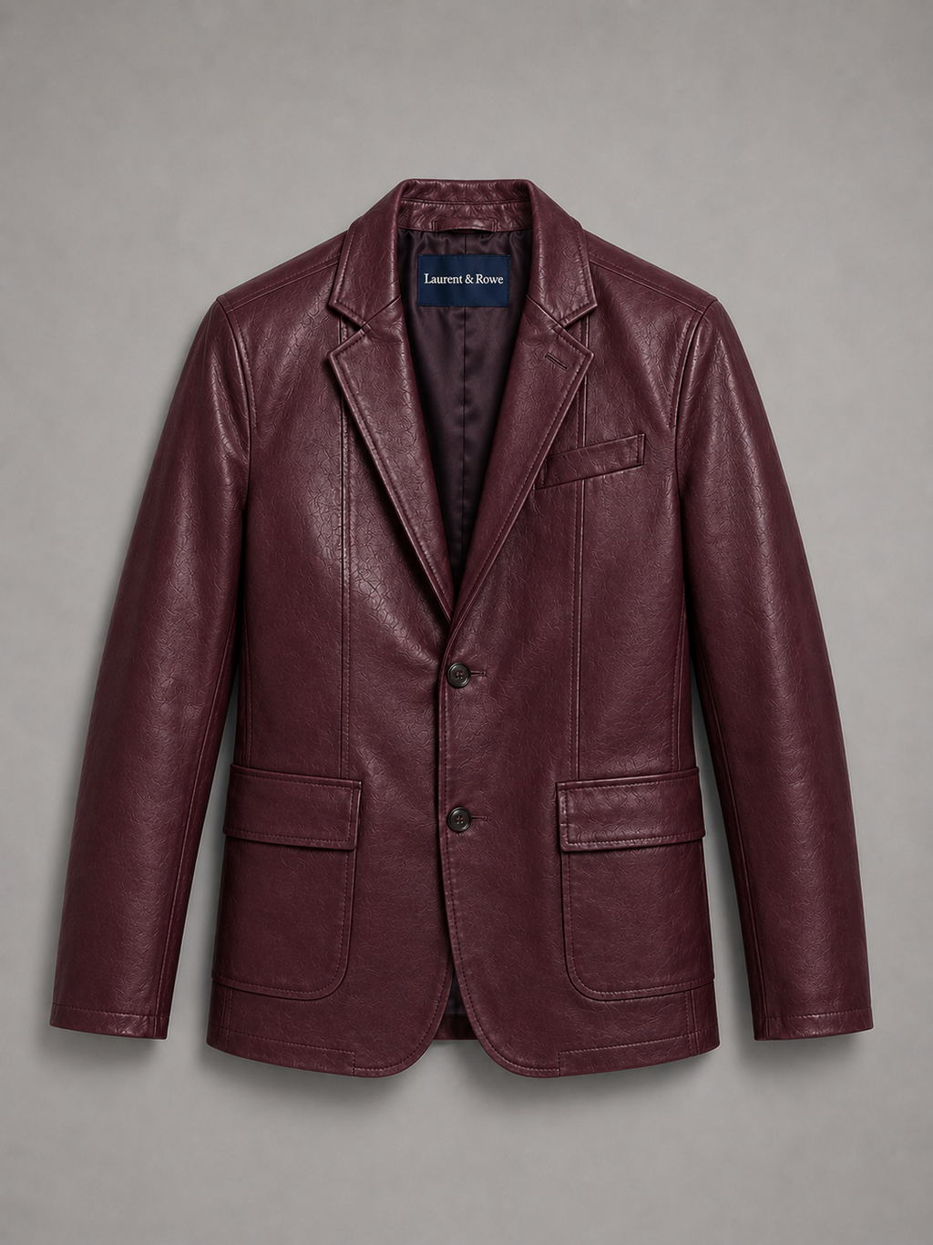 Wine red men’s leather blazer jacket with a slim fit and classic lapel displayed on a plain background