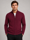 Front view of a man wearing a wine full zip knit sweater with a stand collar, slim fit, long sleeves, and warm fall winter design