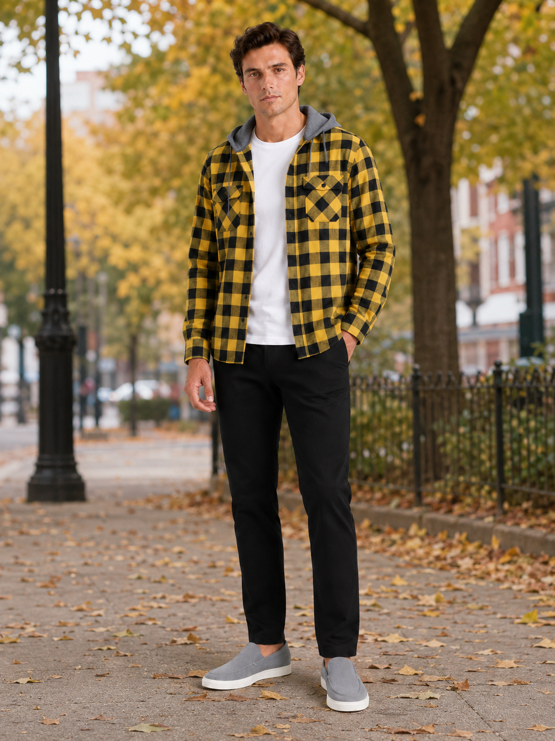 Man styling yellow plaid hooded flannel jacket in a warm fall casual lifestyle outfit