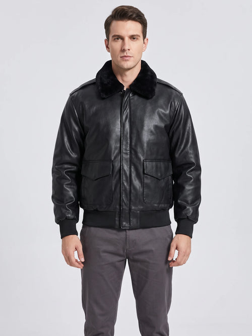 Front studio view of a model wearing a Black leather jacket with a plush collar, flap pockets, and ribbed cuffs and hem.