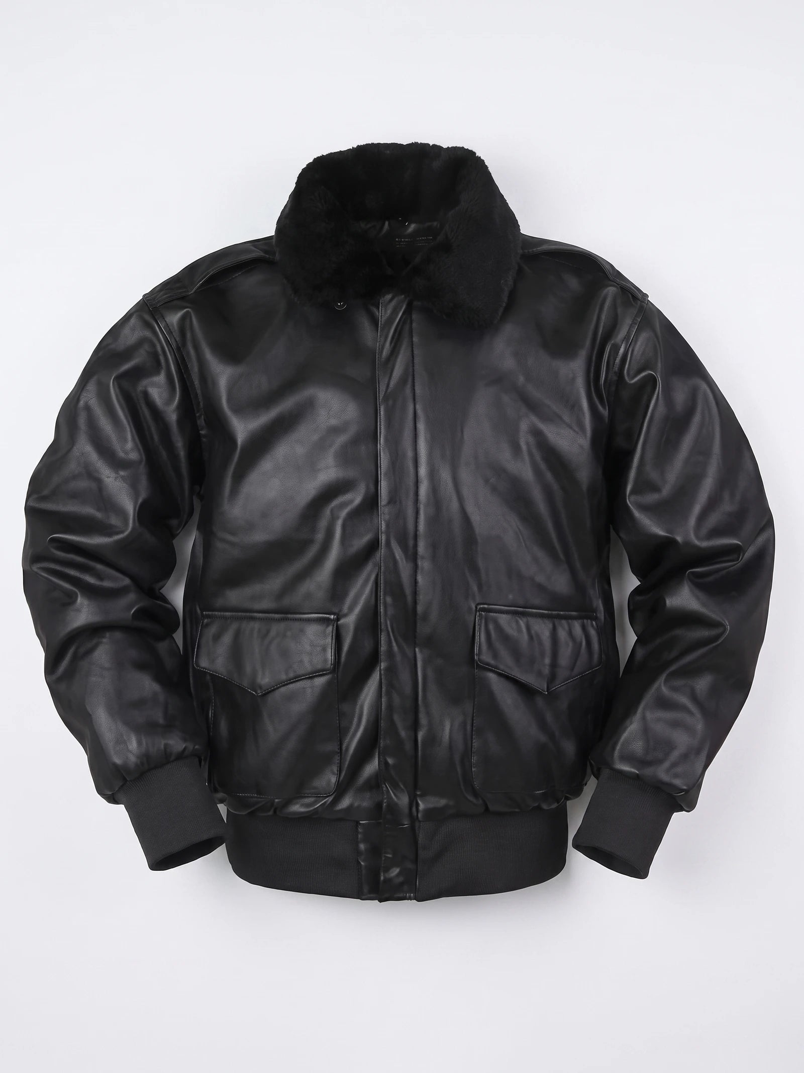 Black leather jacket laid flat, featuring a plush collar, front flap pockets, and ribbed cuffs and hem.