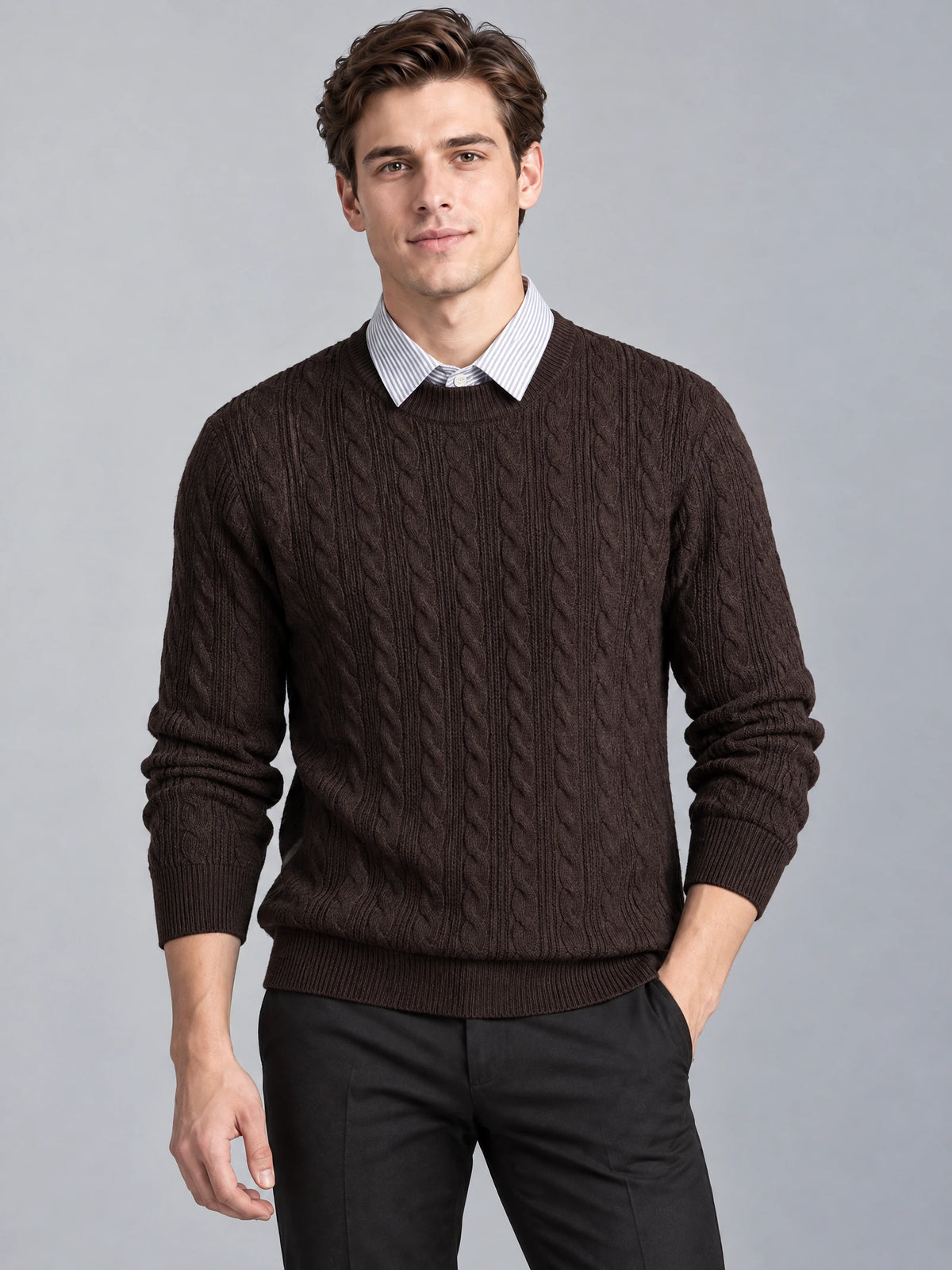 Front studio view of a model wearing a Brown business casual knitted pullover sweater with cable-knit texture and faux shirt collar.