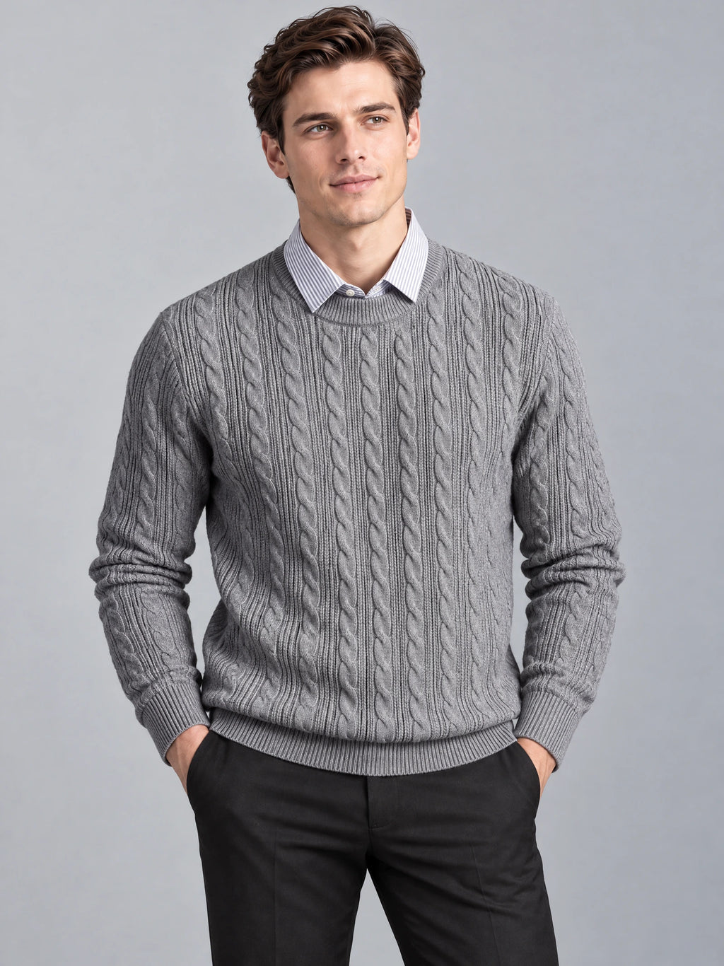Front studio view of a model wearing a Gray business casual knitted pullover sweater with cable-knit texture and a faux shirt collar.