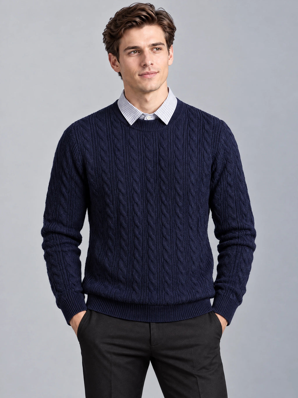 Front studio view of a model wearing a Navy business casual knitted pullover sweater with cable-knit texture and a faux shirt collar.