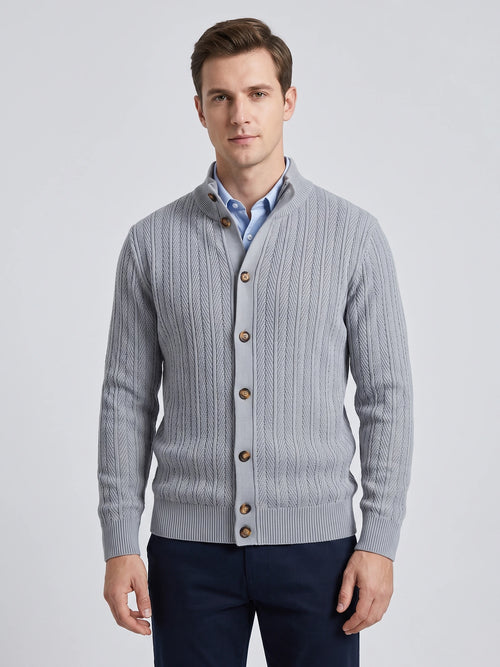 Front studio view of a model wearing a Gray button up cardigan with a stand collar, textured knit pattern, and ribbed cuffs.