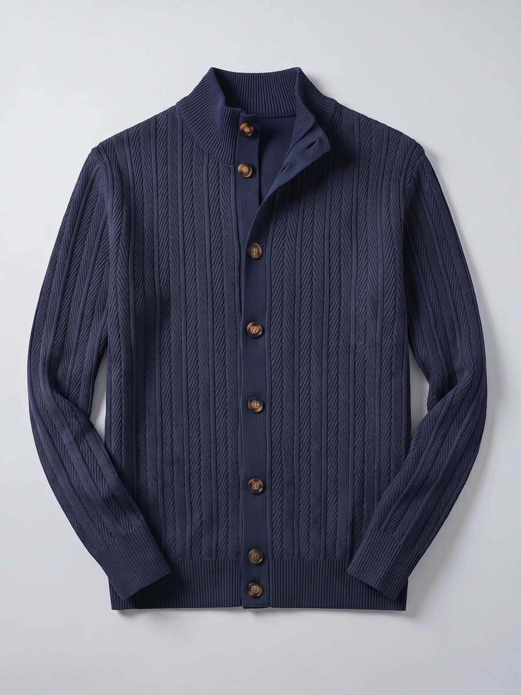 Navy Button Up Cardigan laid flat, featuring a ribbed stand collar, textured knit pattern, button front, and ribbed cuffs.