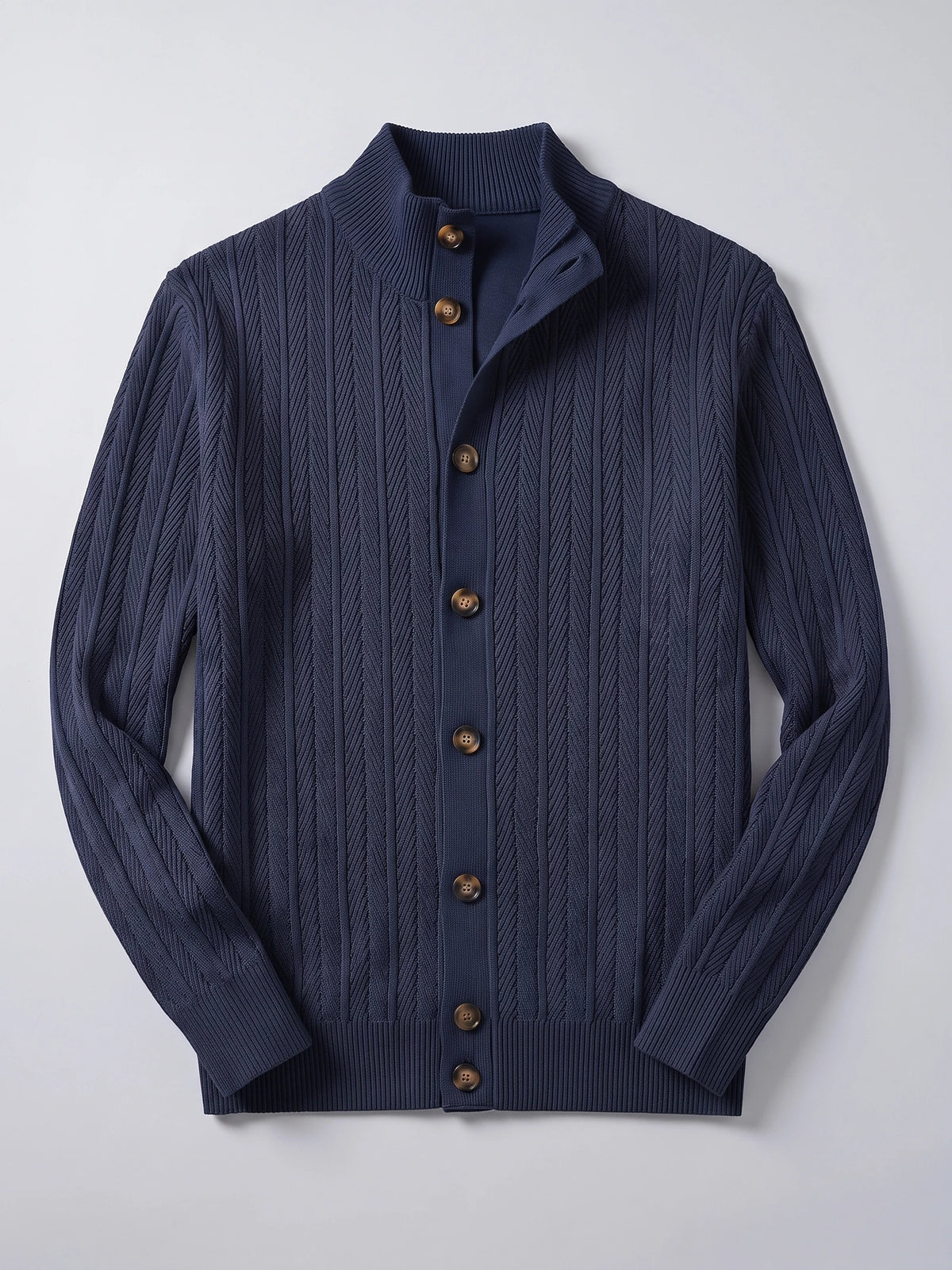 Navy Button Up Cardigan laid flat, featuring a ribbed stand collar, textured knit pattern, button front, and ribbed cuffs.