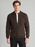 Front studio view of a model wearing a Brown cable knit full zip sweater with a ribbed stand collar.