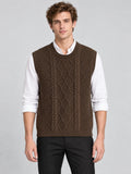 Front studio view of a model wearing a Brown cable knit sweater vest with a ribbed round neck over a collared shirt.