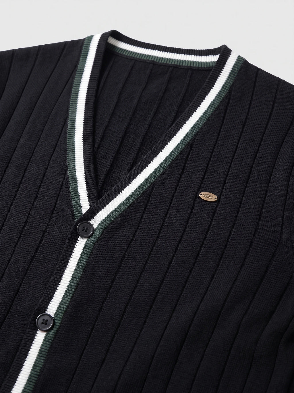Close-up of a Black cotton Cardigan Sweater with ribbed knit texture, striped V-neck trim, and button-front detailing.