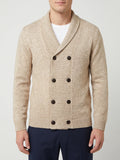 Front studio view of a model wearing a Beige Cardigan Sweater with a ribbed shawl collar and double-breasted button front.