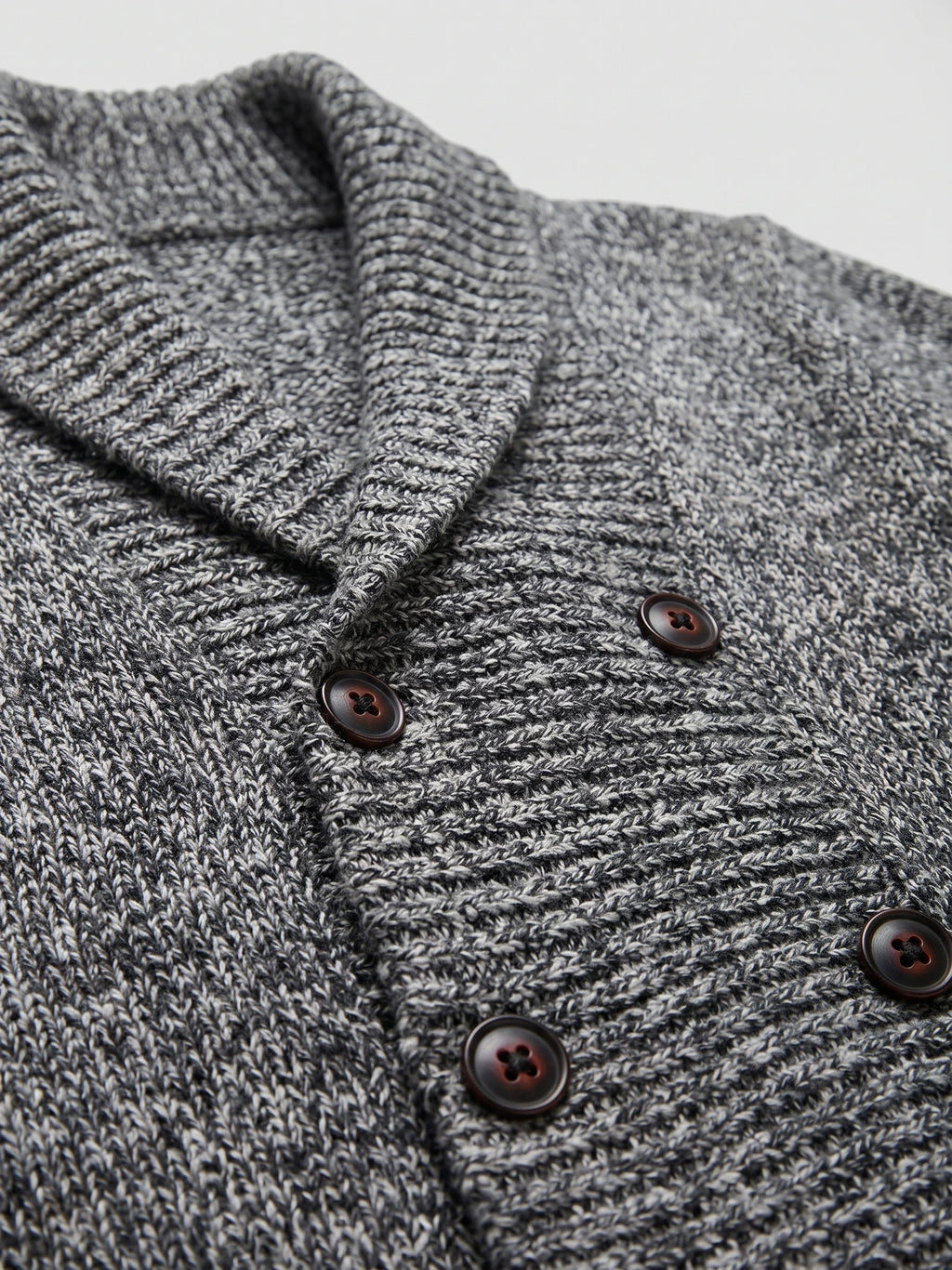 Close-up of the Gray Cardigan Sweater showing textured knit fabric, a ribbed shawl collar, and button-front detail.
