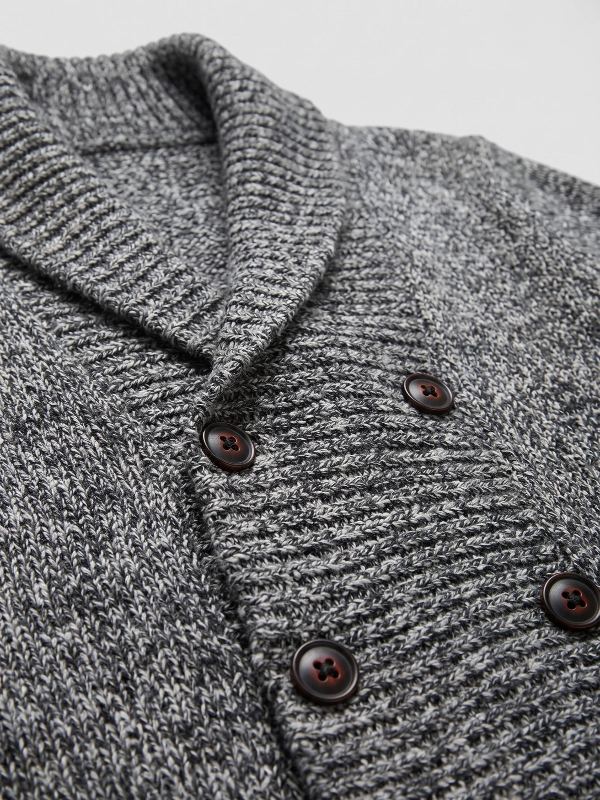Close-up of the Gray Cardigan Sweater showing textured knit fabric, a ribbed shawl collar, and button-front detail.