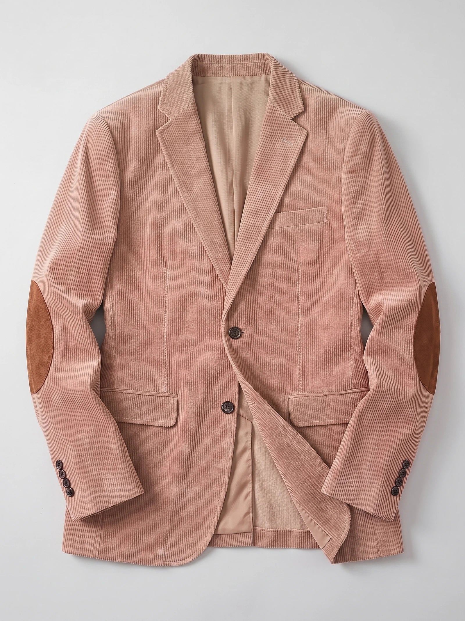 Khaki corduroy blazer laid flat, showing notch lapels, flap pockets, button cuffs, and elbow patches.