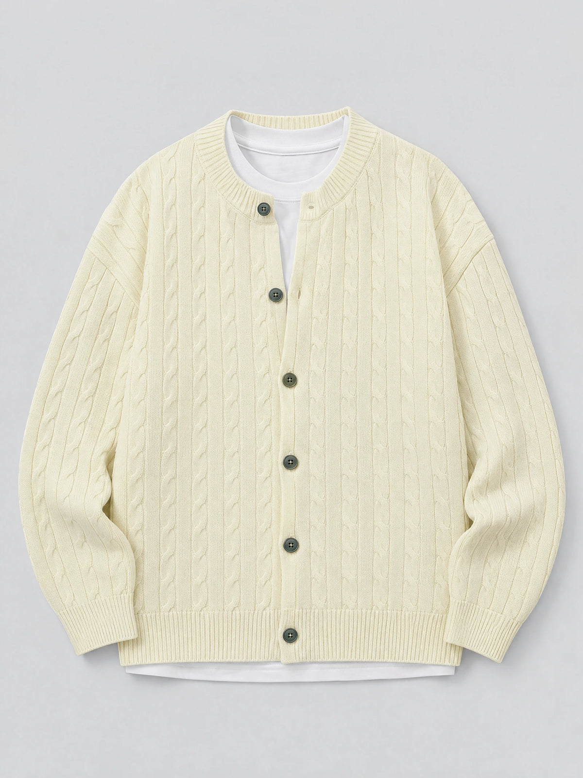 Beige crewneck cardigan laid flat, featuring a cable-knit texture, button front, and ribbed cuffs and hem.