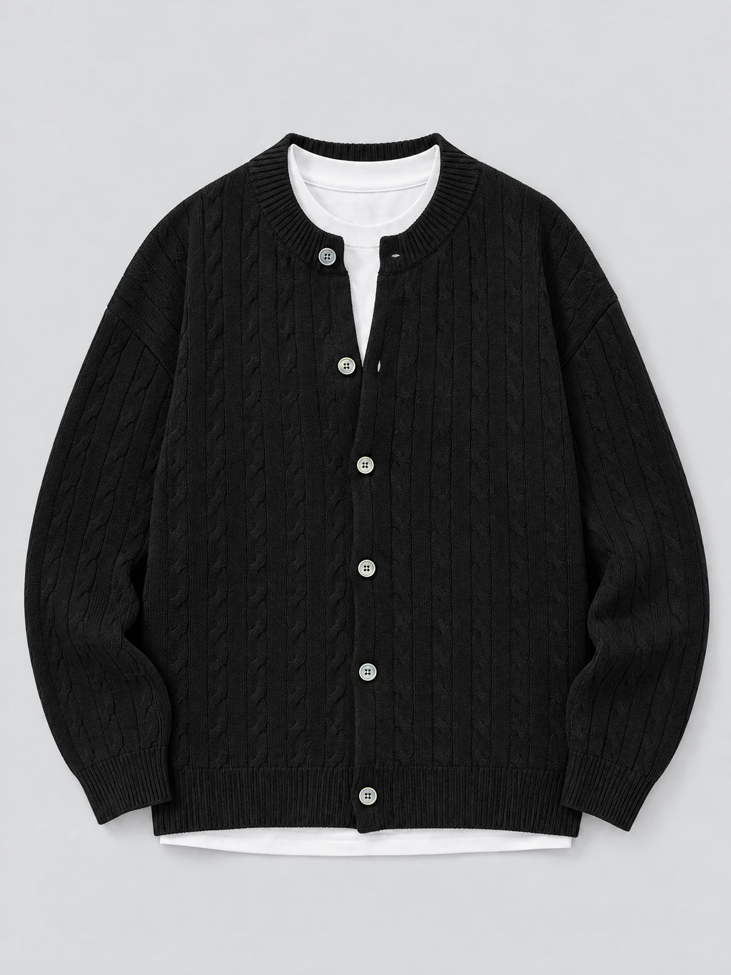 Black crewneck cardigan laid flat, featuring a cable-knit texture, ribbed trim, and button-front closure.