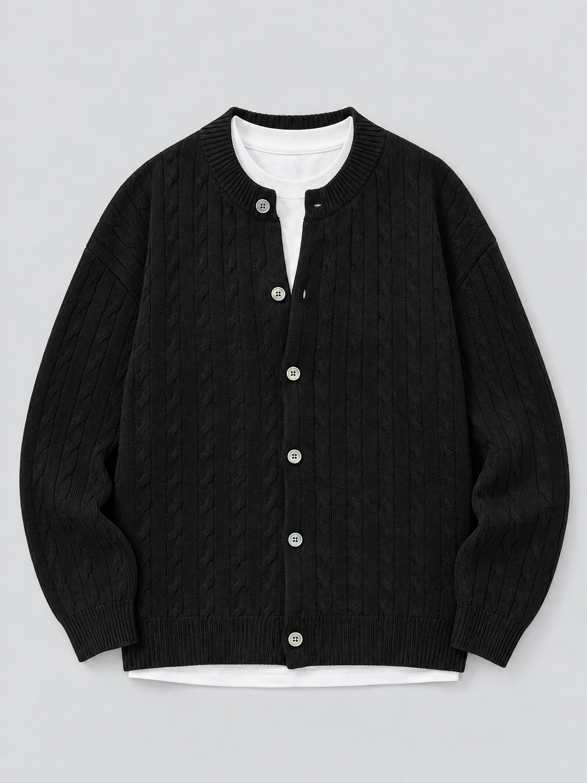 Black crewneck cardigan laid flat, featuring a cable-knit texture, ribbed trim, and button-front closure.