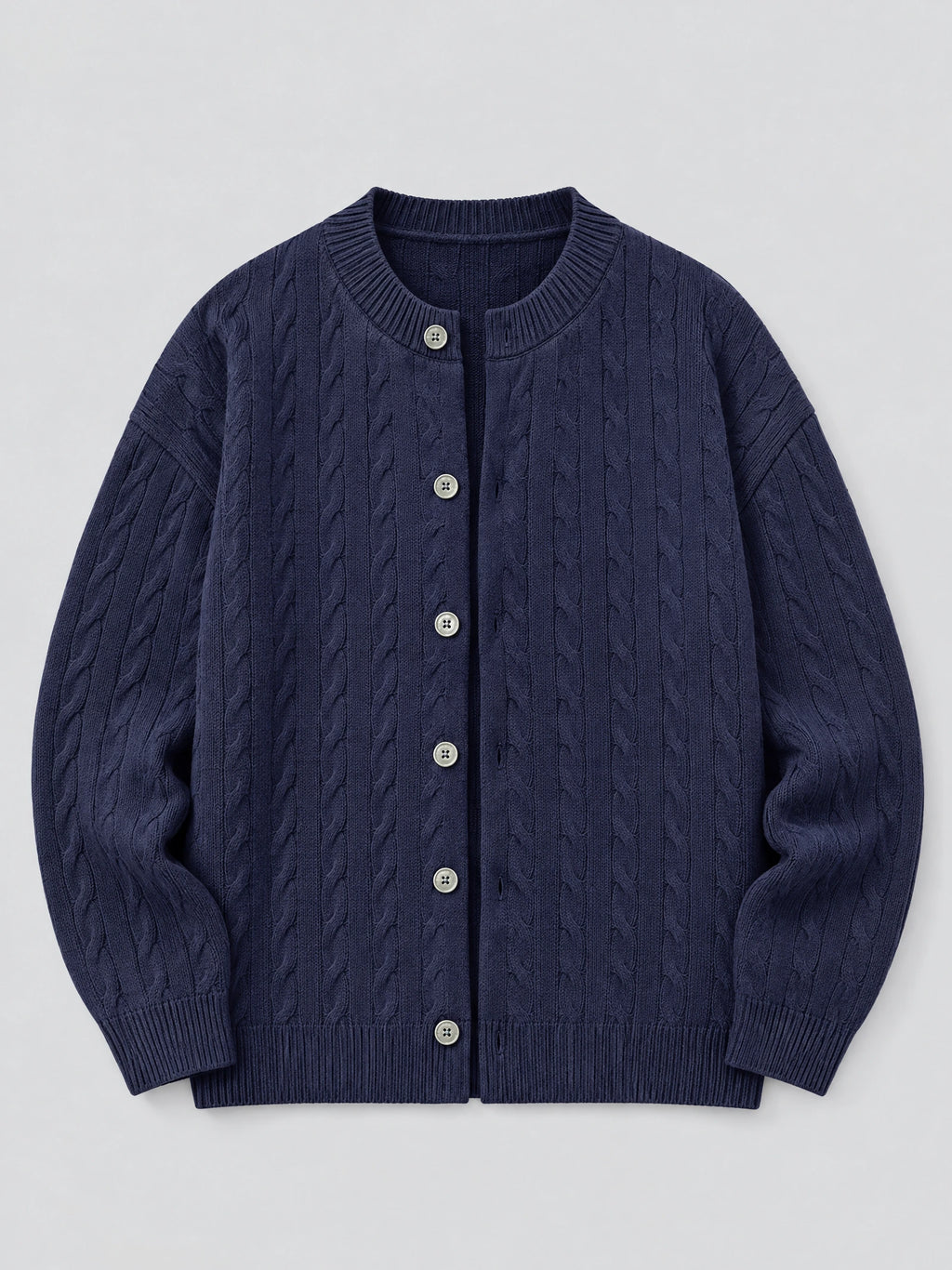Navy crewneck cardigan laid flat, showing cable-knit texture, ribbed trim, and front button closure.