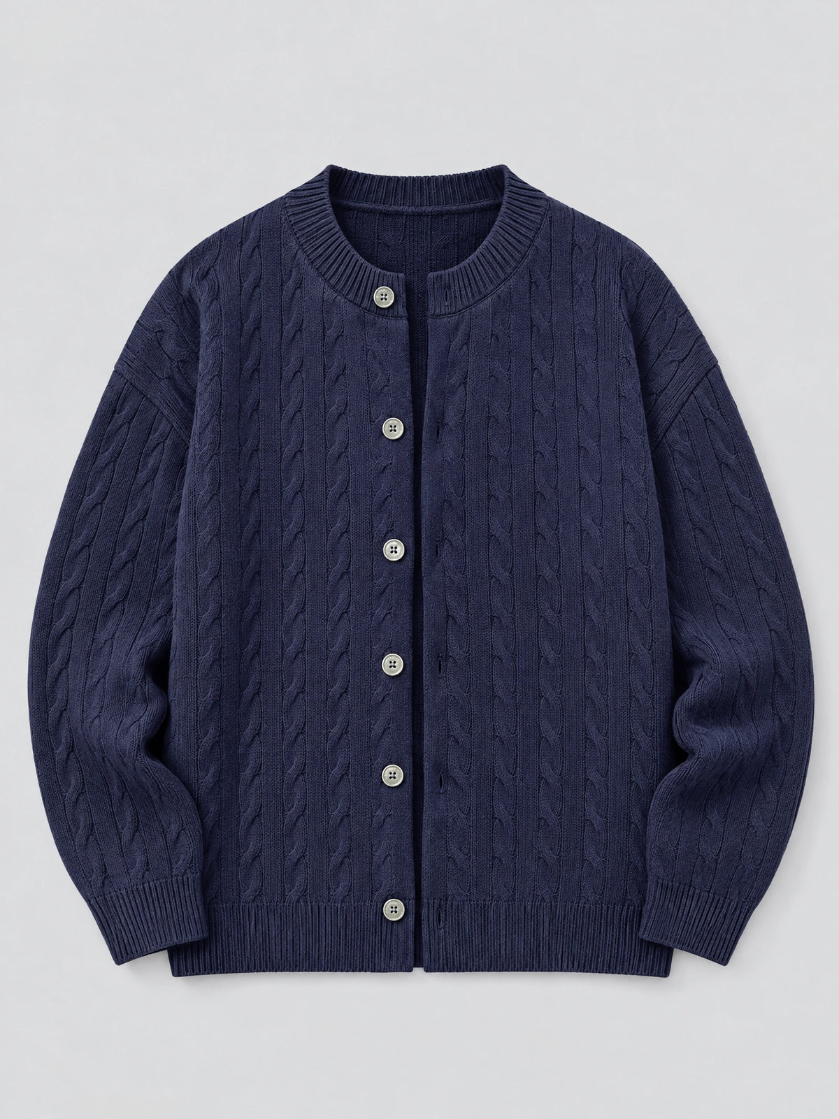 Navy crewneck cardigan laid flat, showing cable-knit texture, ribbed trim, and front button closure.