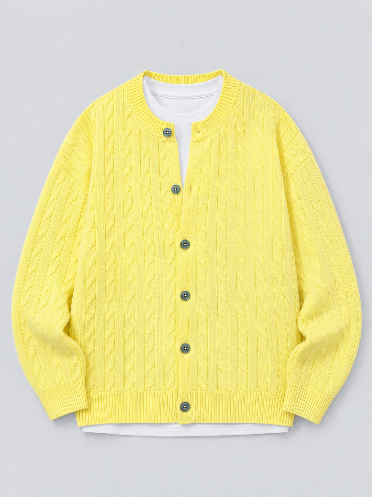 Yellow crewneck cardigan laid flat, showing cable-knit texture, button front, and ribbed cuffs and hem.